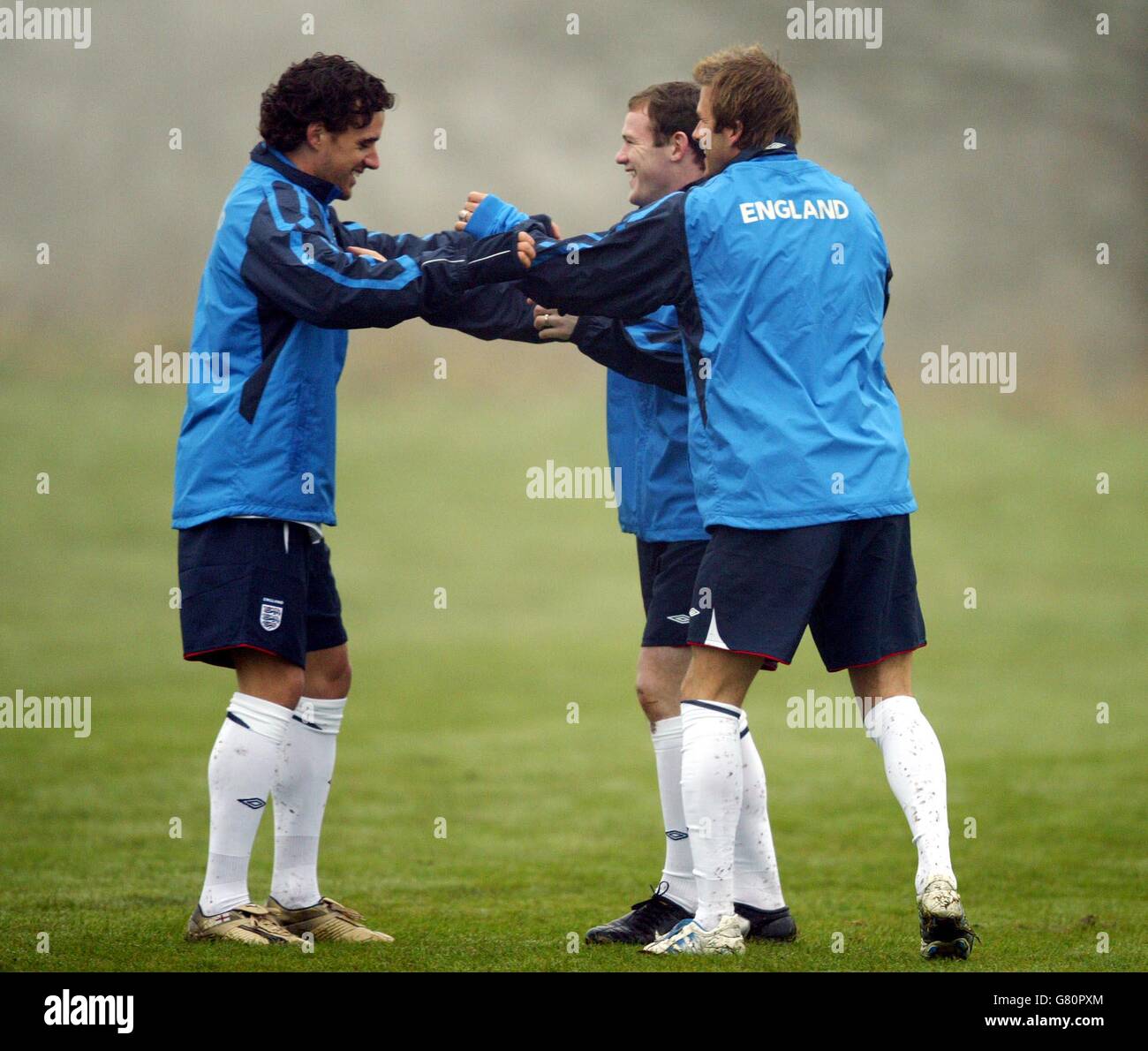 l-r England's Owen Hargreaves, Wayne Rooney and David Beckham have a ...