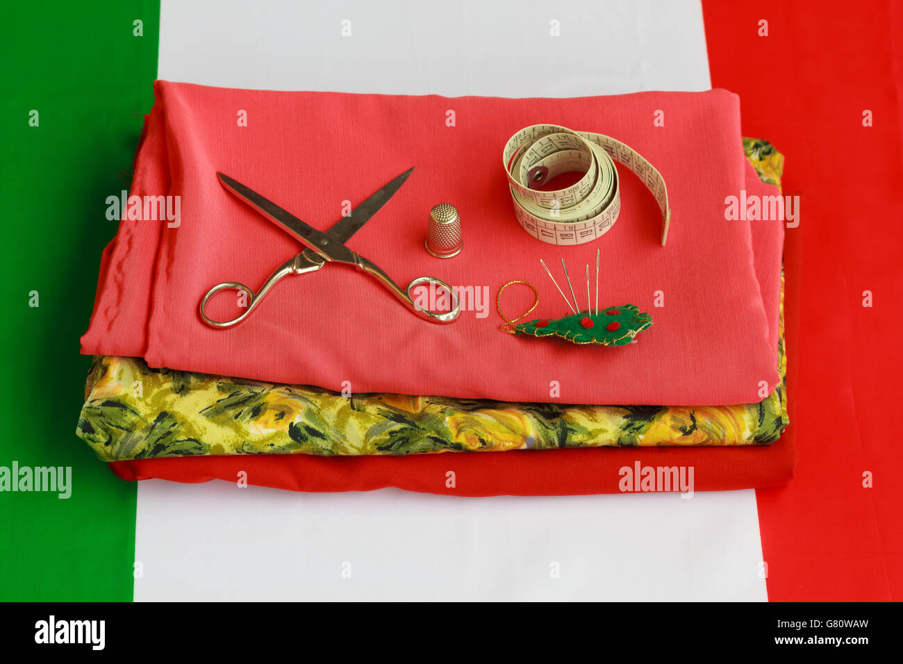 italian tailoring /scissors,needles,thimble and meter used by a tailor