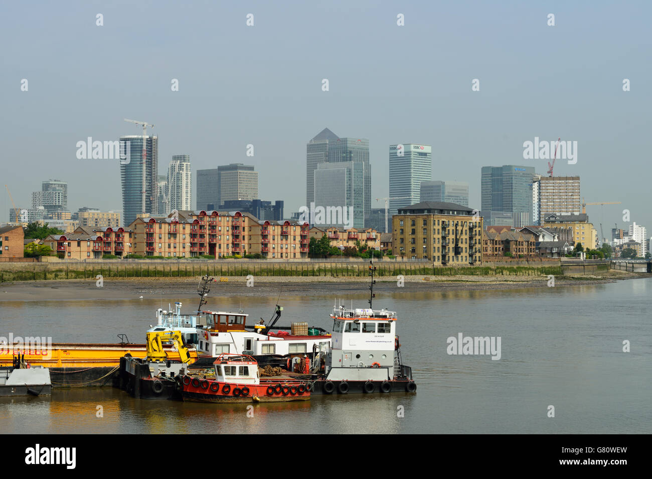 Working River Thames, Canary Wharf, East London, United Kingdom Stock Photo