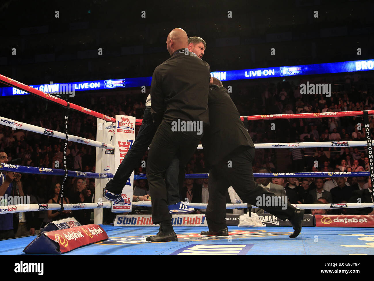 Boxing Ring O2 A man is removed from the ring by security at the O2 Arena, London ...