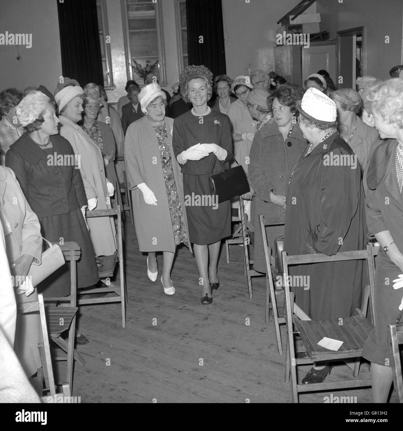 The Duchess of Kent (r) walking with president, Marjorie Ridgewell, when attending a meeting of the Women's Institute in the Village Hall in Iver, Buckinghamshire. Stock Photo
