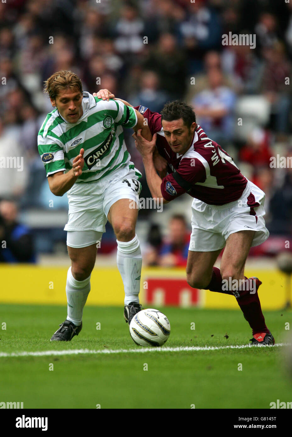 Soccer - Tennents Scottish Cup - Semi-Final - Heart of Midlothian v Celtic - Hampden Park. Heart of Midlothian's Jamie McAllister and Celtic's Stiliyan Petrov Stock Photo