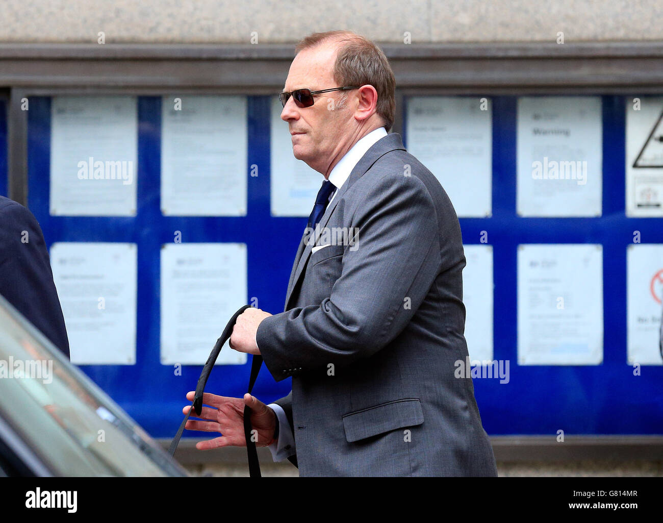 Ex-specialist firearms officer Anthony Long leaves the Old Bailey, London, where he faces trial for the murder of robbery suspect Azelle Rodney. Stock Photo