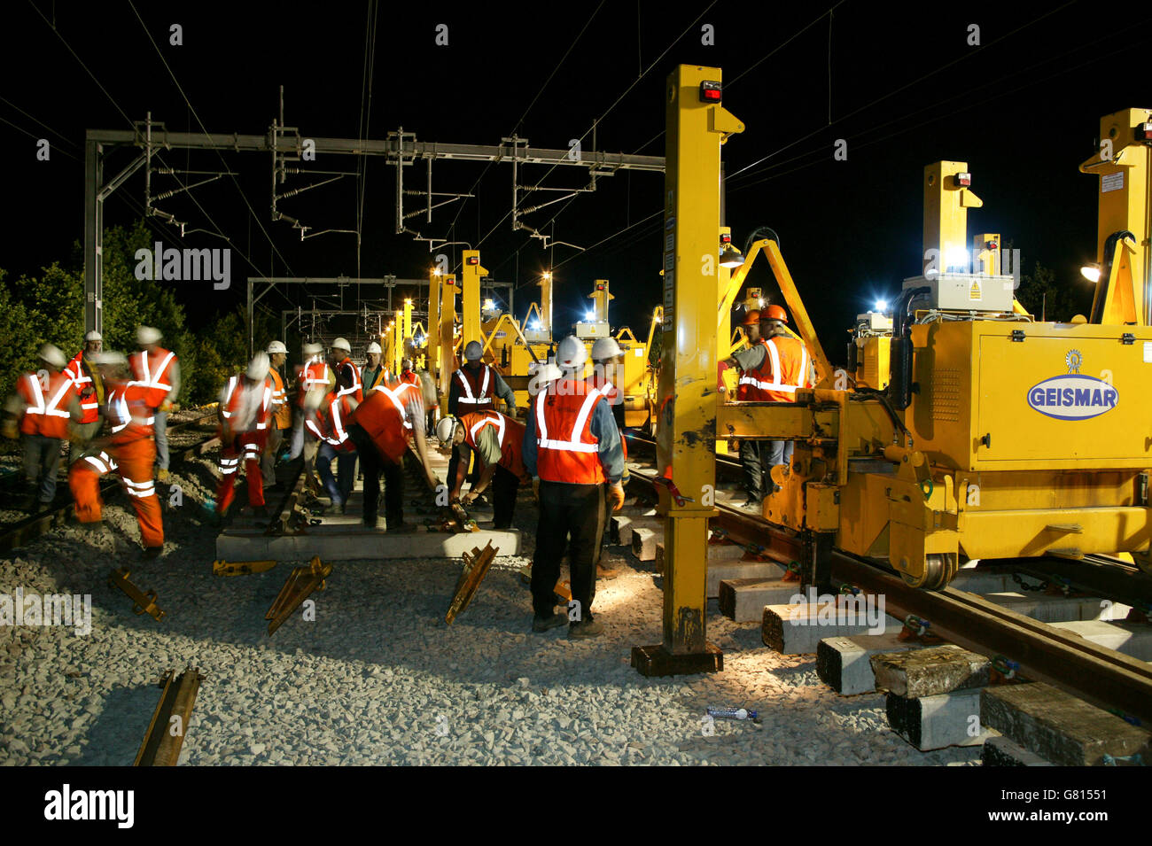 Trimming the new rail to a perfect fit at Bourne End as part of the