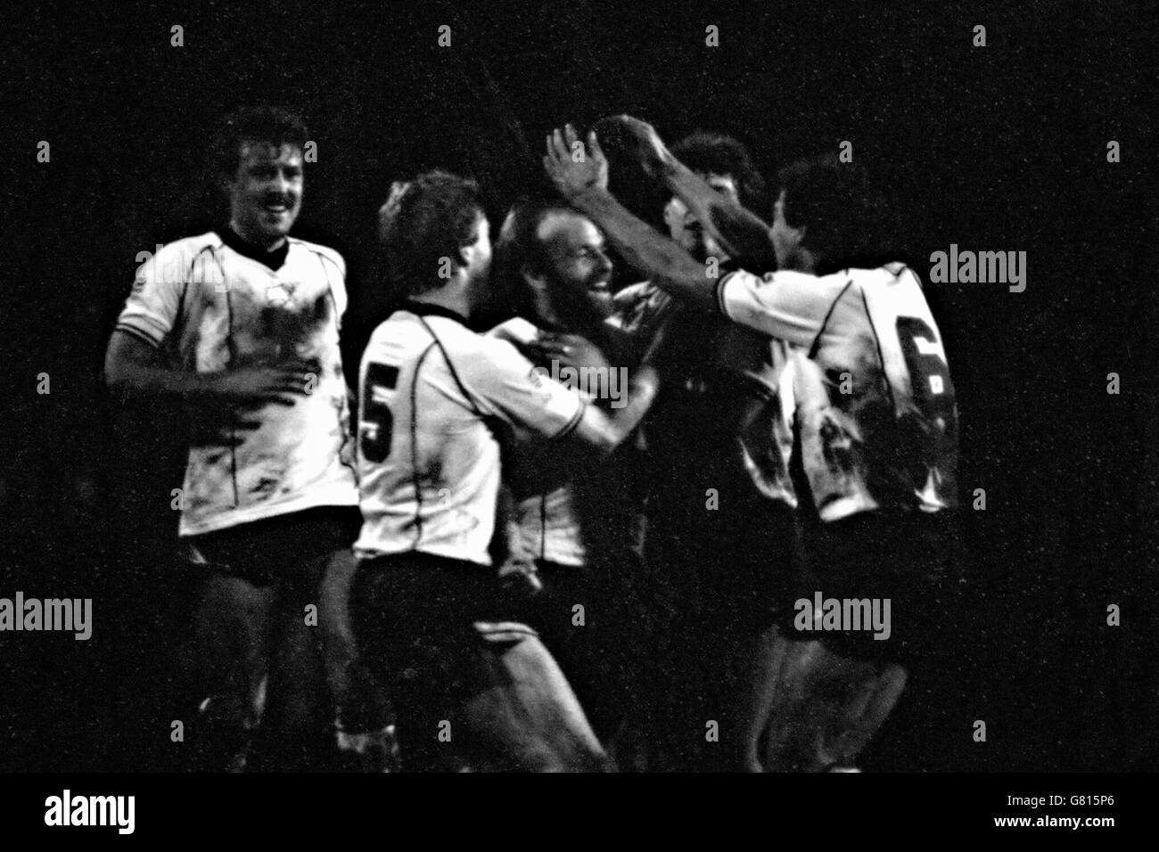 Derby County's Archie Gemmill (c) is congratulated by his jubilant teammates after scoring the opening goal from a free kick. Stock Photo