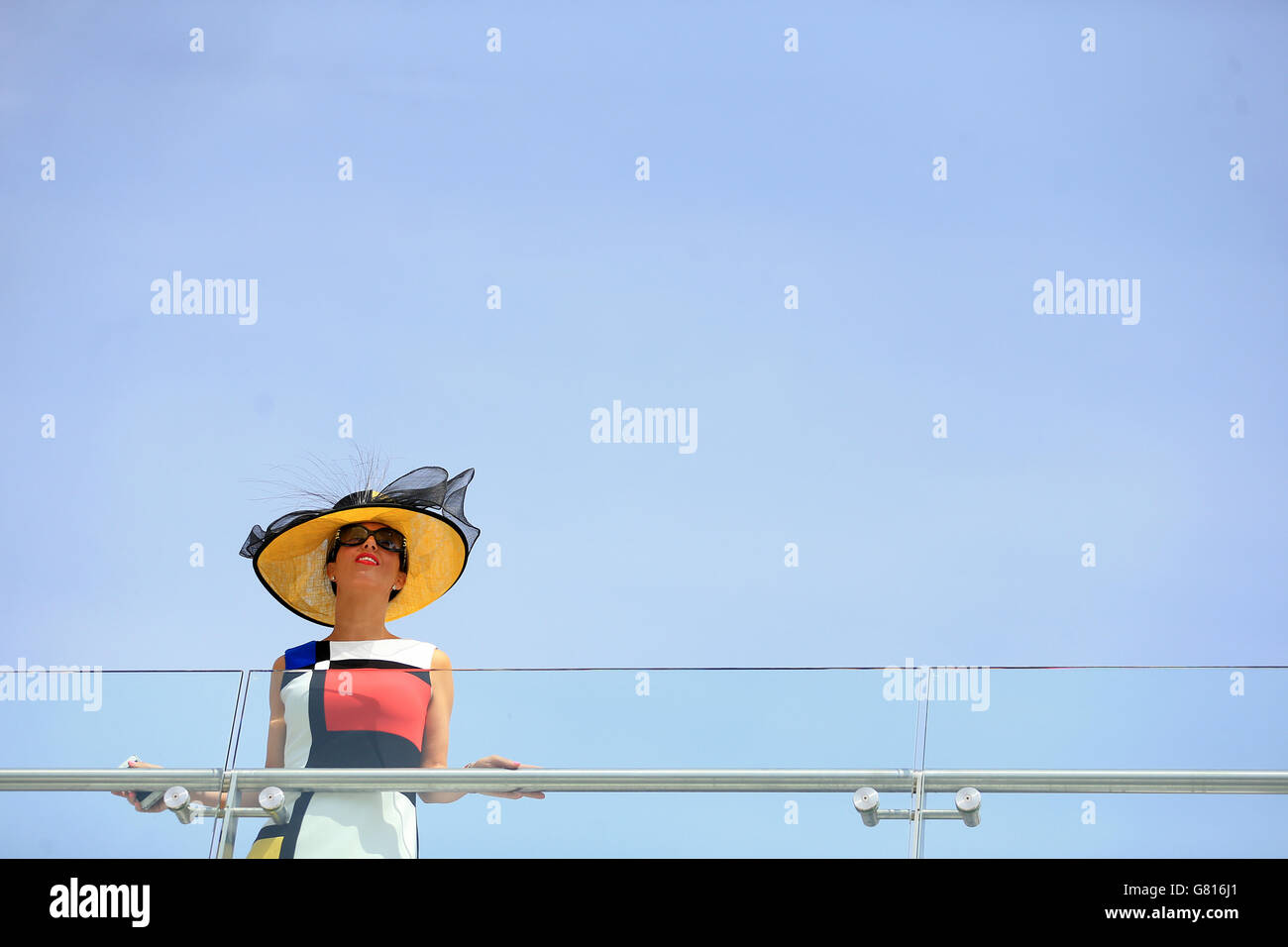 Horse Racing - 2015 Dante Festival - Betfred Yorkshire Cup - York Racecourse. A racegoer soaks up the atmosphere Stock Photo