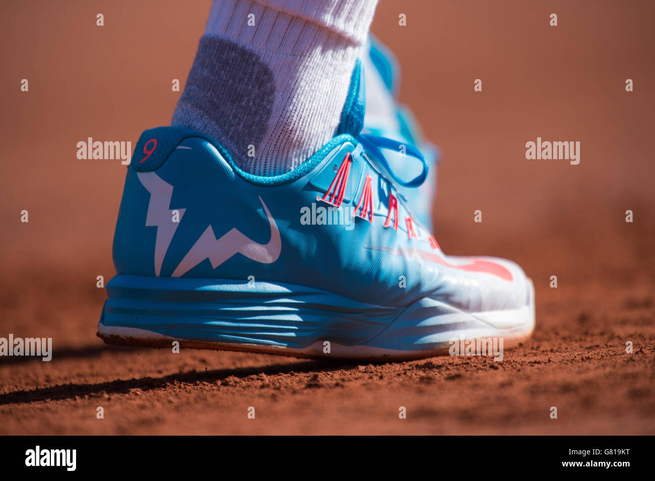 Rafael Nadal wears customised Nike tennis shoes during early morning  practice on Philippe Chatrier Court on day three of the French Open at  Roland Garros on May 26, 2015 in Paris, France