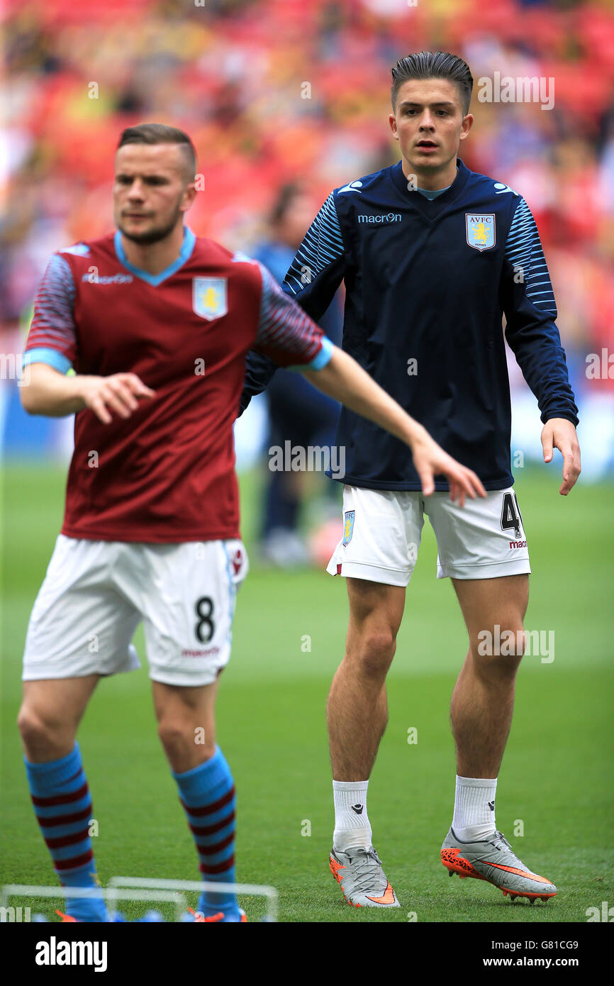 Aston Villa's Jack Grealish (right) warms up with team-mate Tom Cleverley before the FA Cup Final at Wembley Stadium, London. PRESS ASSOCIATION Photo. Picture date: Saturday May 30, 2015. See PA Story SOCCER FA Cup. Photo credit should read: Nick Potts/PA Wire. RESTRICTIONS: Maximum 45 images during a match. No video emulation or promotion as 'live'. No use in games, competitions, merchandise, betting or single club/player services. No use with unofficial audio, video, data, fixture Stock Photo