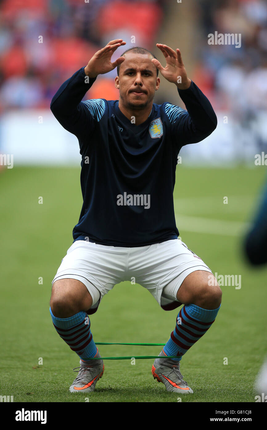 Aston Villa's Gabriel Agbonlahor warms up before the FA Cup Final at Wembley Stadium, London. PRESS ASSOCIATION Photo. Picture date: Saturday May 30, 2015. See PA Story SOCCER FA Cup. Photo credit should read: Nick Potts/PA Wire. RESTRICTIONS: Maximum 45 images during a match. No video emulation or promotion as 'live'. No use in games, competitions, merchandise, betting or single club/player services. No use with unofficial audio, video, data, fixture Stock Photo