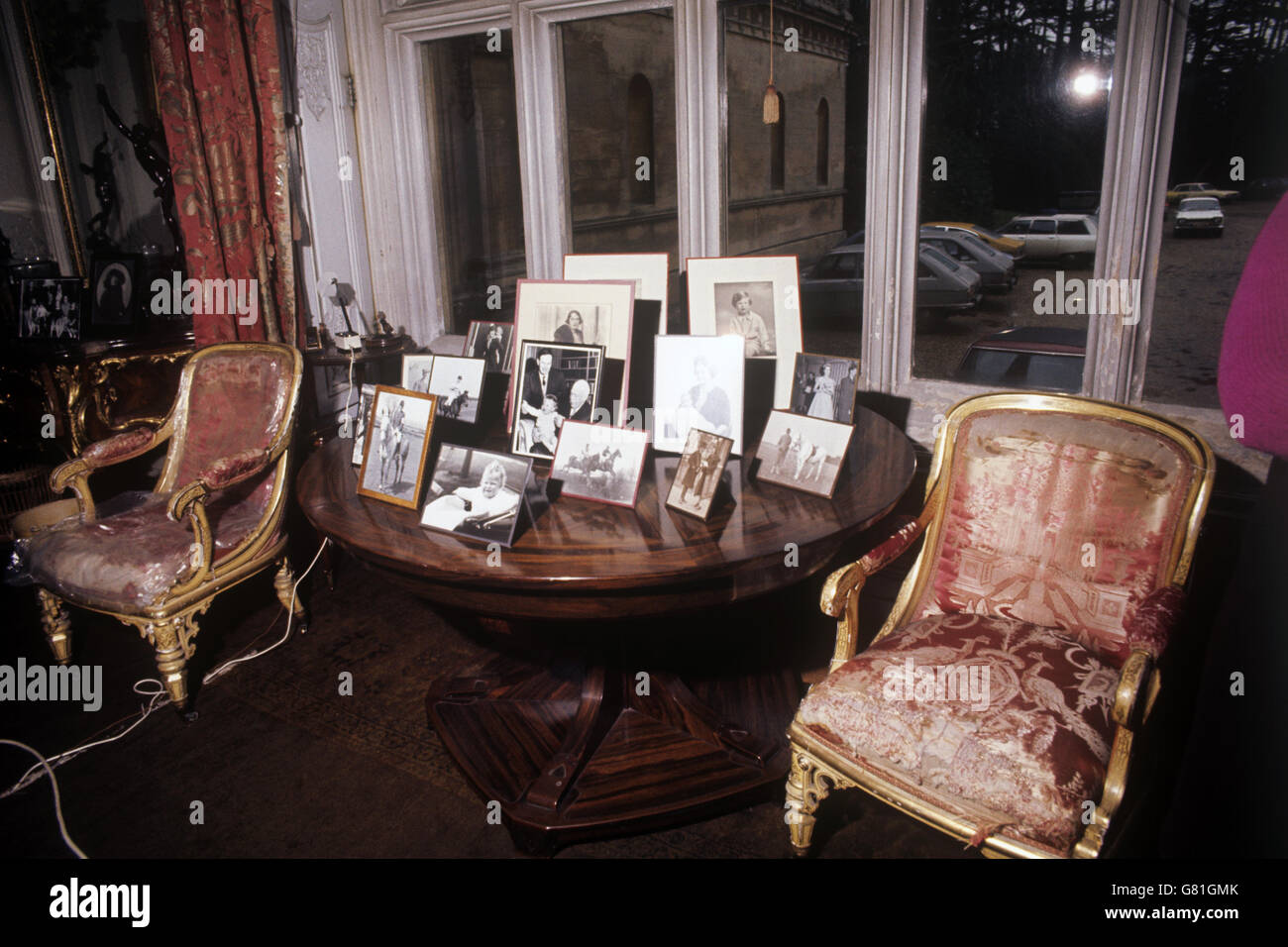 Buildings and Landmarks - Mentmore Towers - Buckinghamshire. Family photographs on a table in Dame Eva Primrose, Countess of Rosebery's private study at Mentmore Towers. Stock Photo