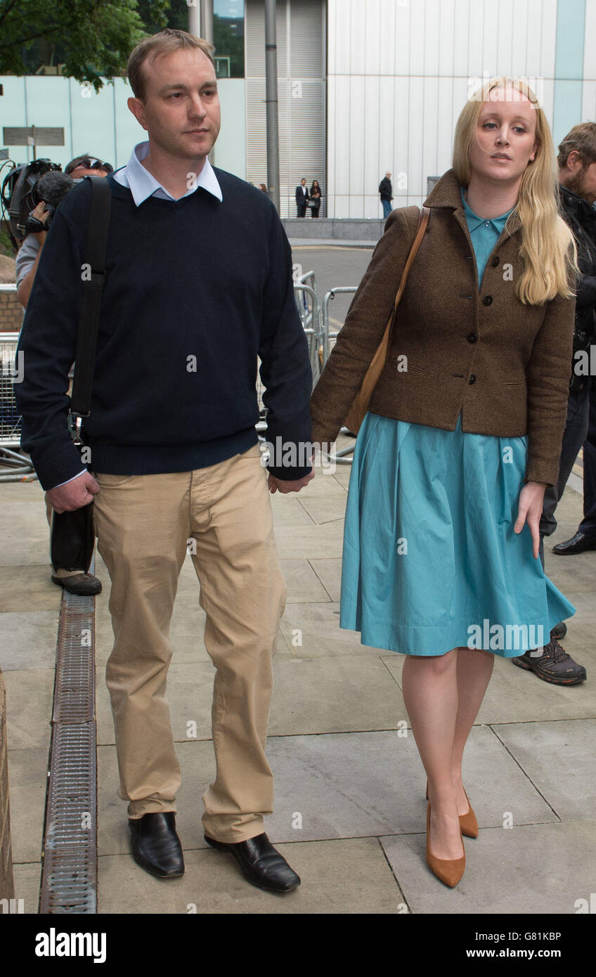 Tom Hayes (left) with wife Sarah, as he leaves Southwark Crown Court as the highly-paid trader motivated by greed was the 'ringmaster' in an enormous fraud to rig benchmark interest rates known as Libor, the court heard. Stock Photo