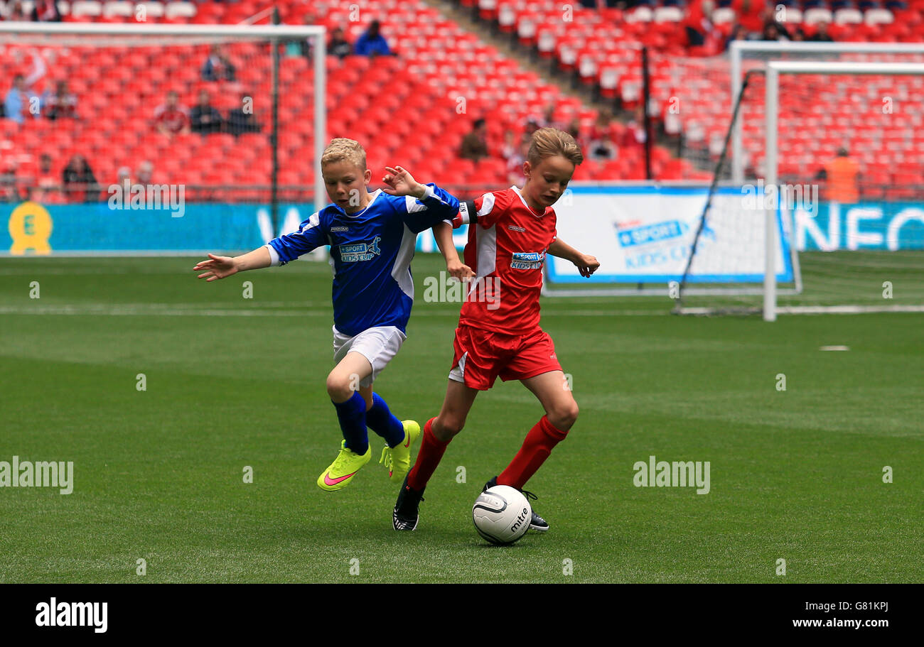 A general view of the action between The Oaks Primary school and South Failsworth Primary school during the Kinder+Sport Football League Kids Cup Final Stock Photo