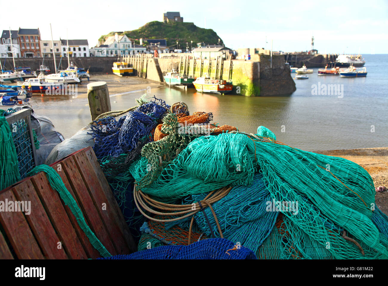 Colourful nets in the working harbour at Ilfracombe, North Devon, UK Stock Photo