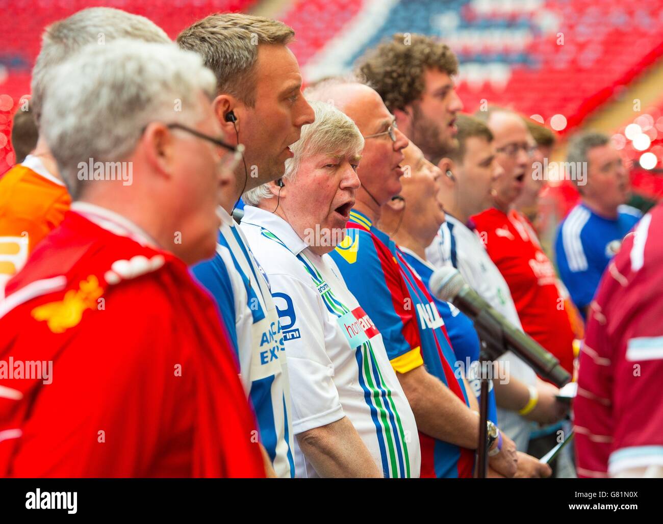 The BBC Songs of Praise FA Cup Fans Choir rehearse at Wembley, ahead of singing Abide with Me at the FA Cup Final on Saturday May 30, which will be broadcast on BBC 1 from 1555. Stock Photo