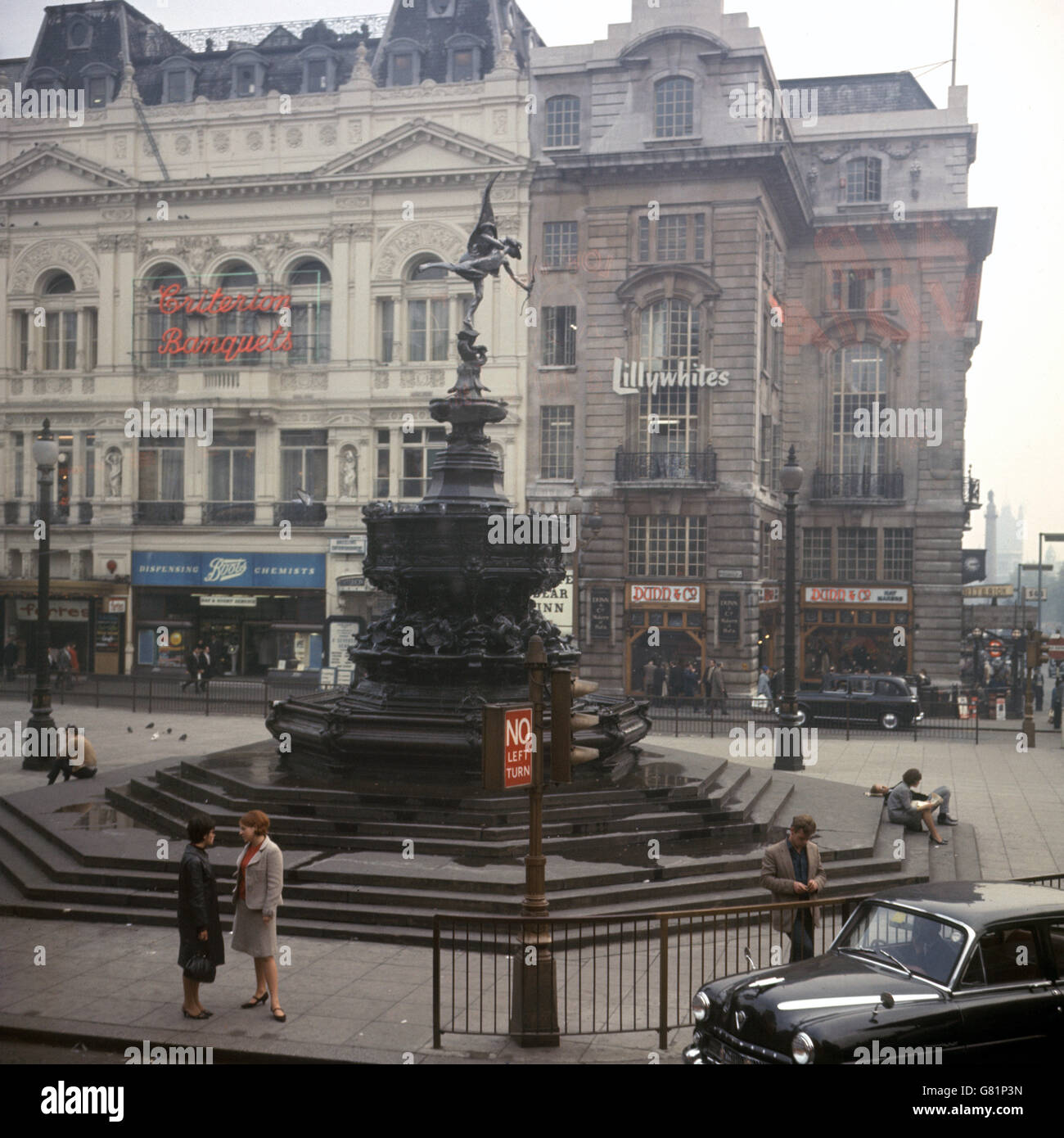 The Statue of Eros in Piccadilly Circus. The fountain was erected in 1892 as a memorial is to commemorate Lord Shaftesbury. The statuette on top is actually Anteros, twin brother of Eros. Stock Photo