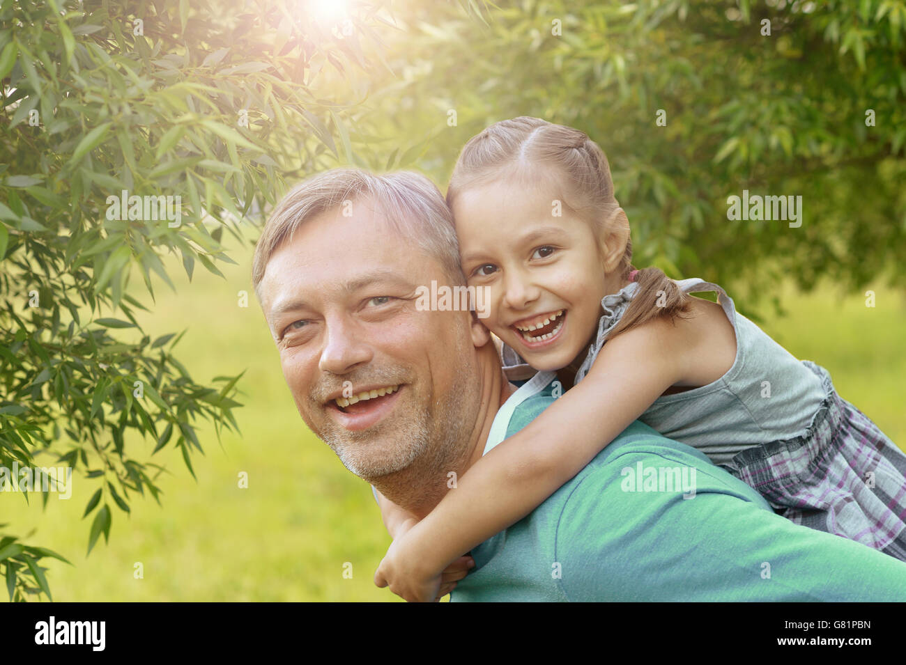 father with daughter in summer park Stock Photo - Alamy