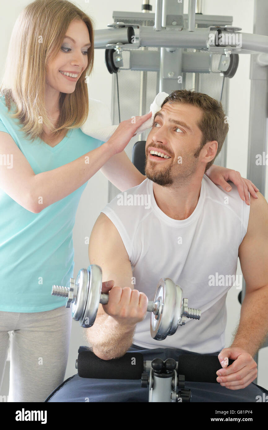 Attractive couple at the gym Stock Photo - Alamy