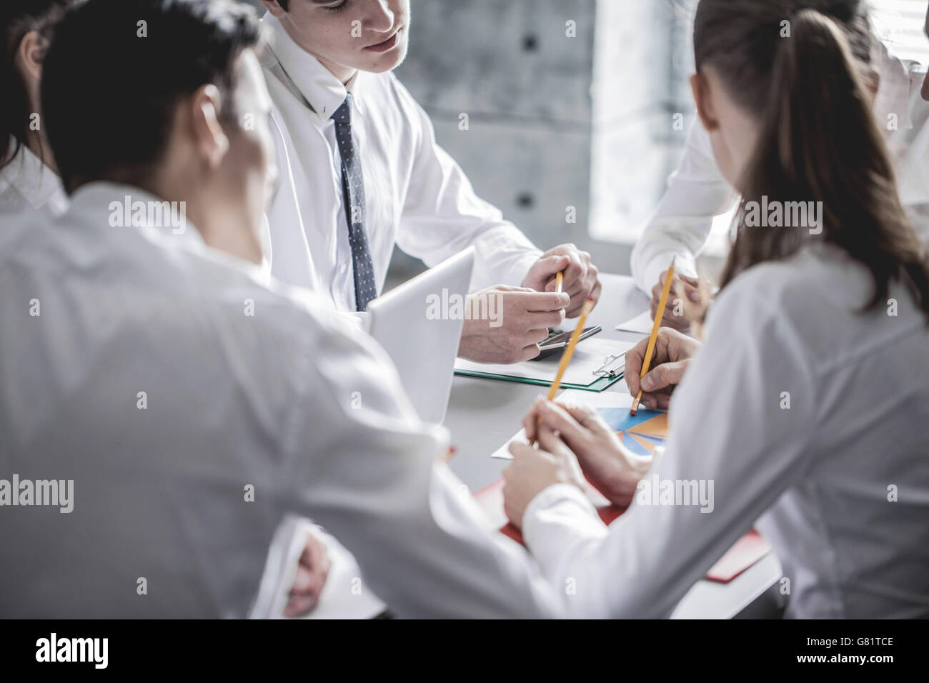 Group of business people working together at meeting in office Stock ...