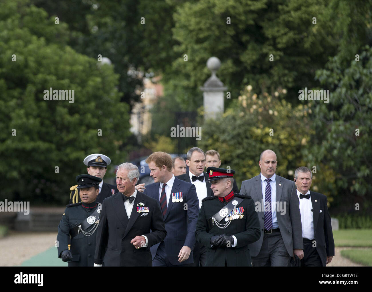 The Prince of Wales (3rd left) and Prince Harry (centre, left) arrive to attend a reception prior to the Gurkha 200 Pageant at the Royal Hospital Chelsea, London. Stock Photo