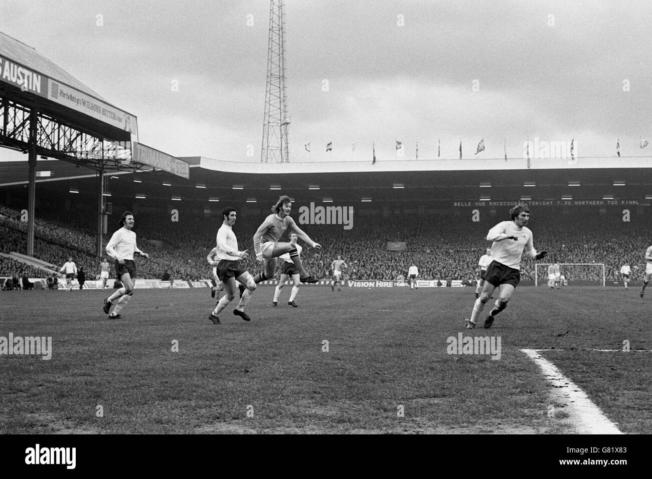 Manchester City's Rodney Marsh (second r) fires home one of his team's two goals, watched by Derby County's Roy McFarland (l), John Robson (second l) and Colin Todd (r) Stock Photo