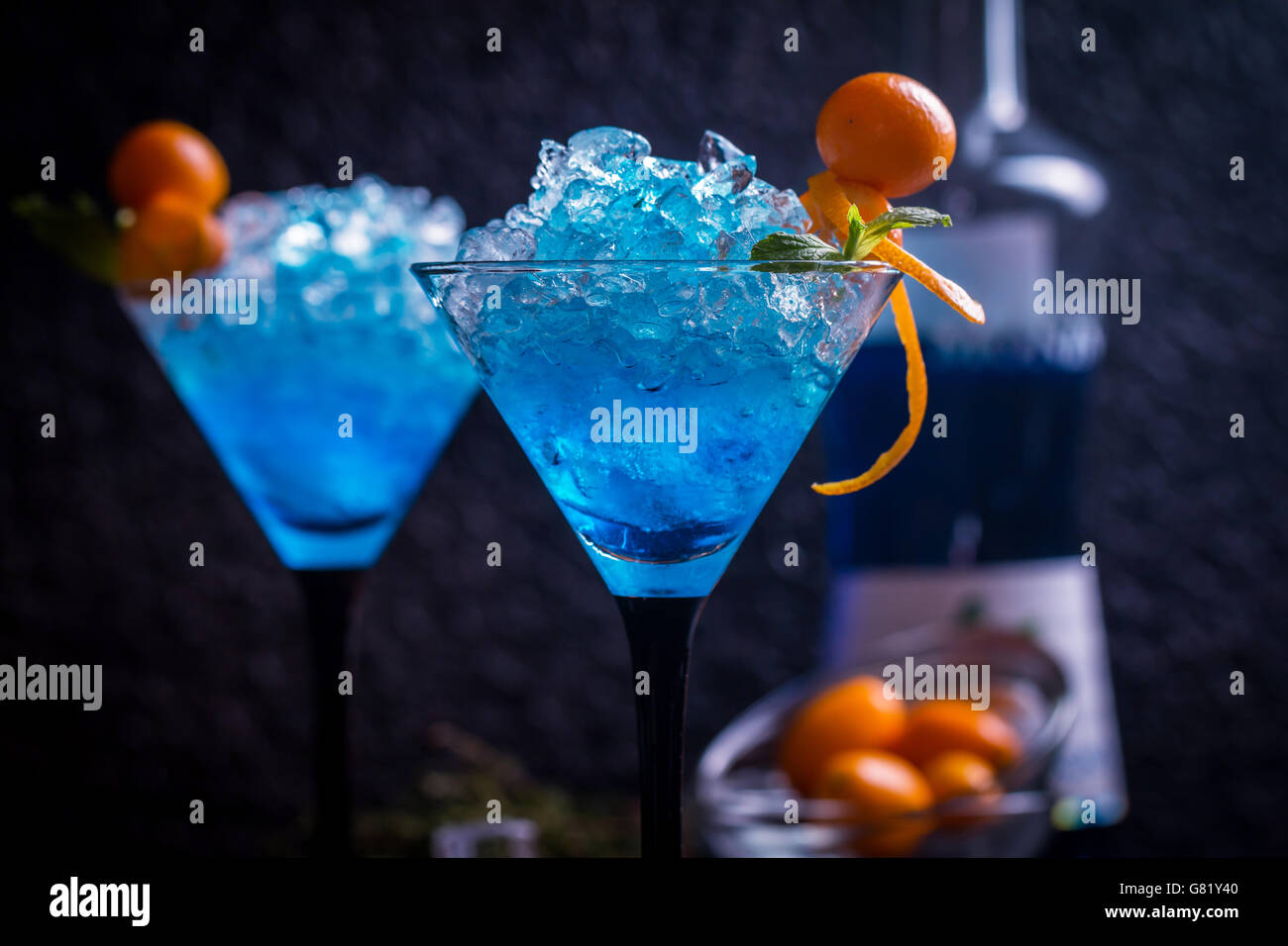 Blue cocktail in martini glasses Stock Photo Alamy