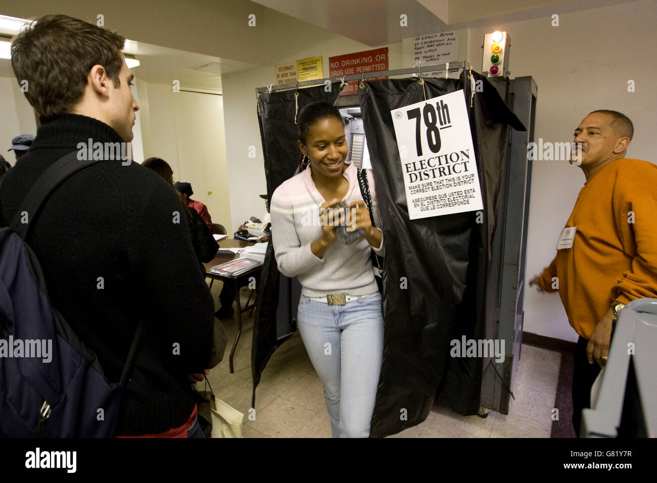 First-time voter exits a booth after voting in US general election at a voting site in Harlem, New York, USA , 4 November 2008 Stock Photo