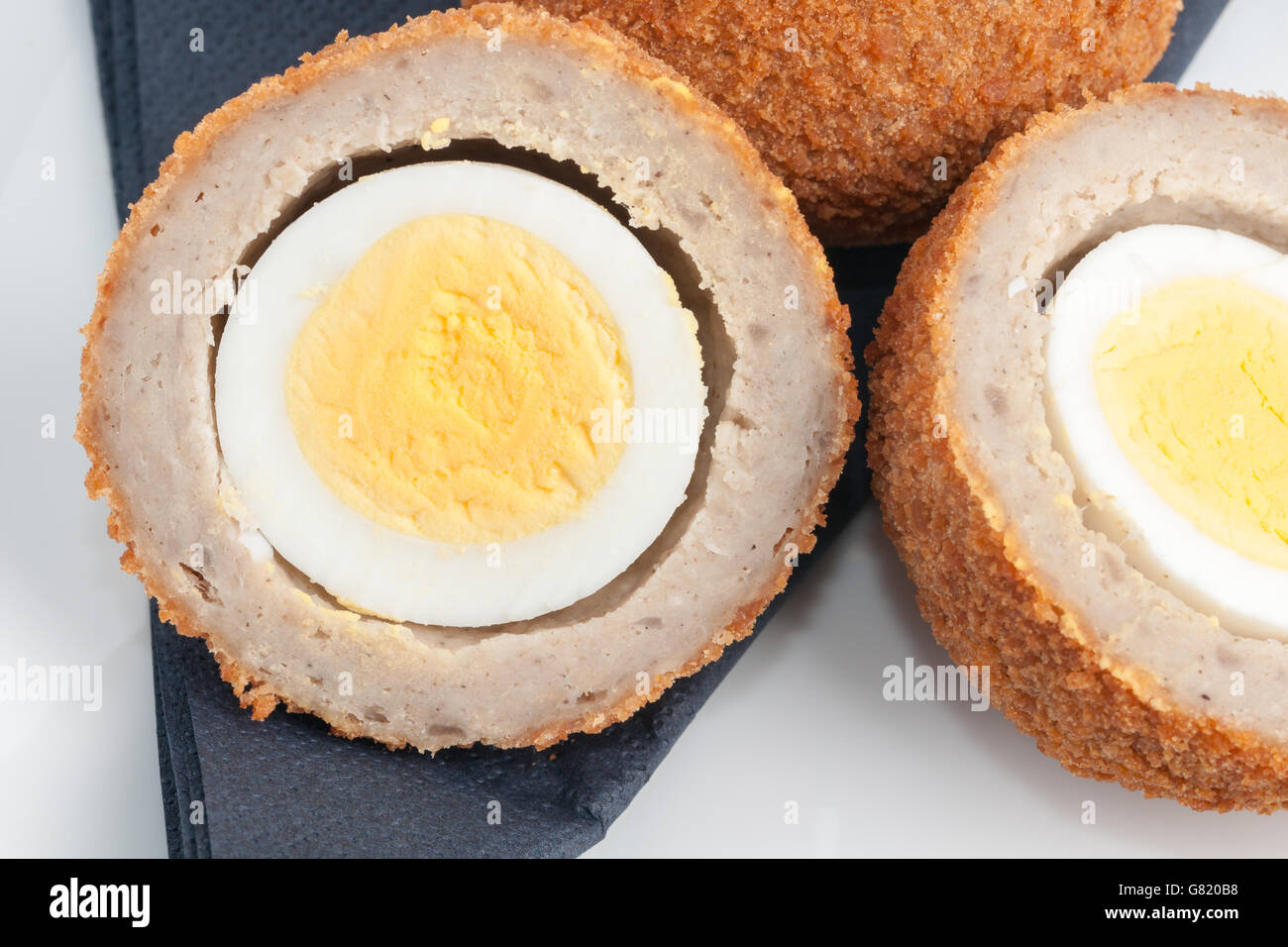Scotch eggs a hard boiled egg wrapped in pork sausage meat and