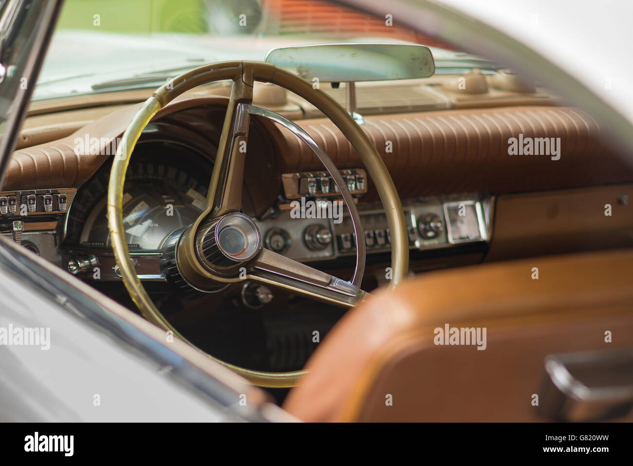 Steering wheel and dashboard of a 1960s American car Stock Photo Alamy