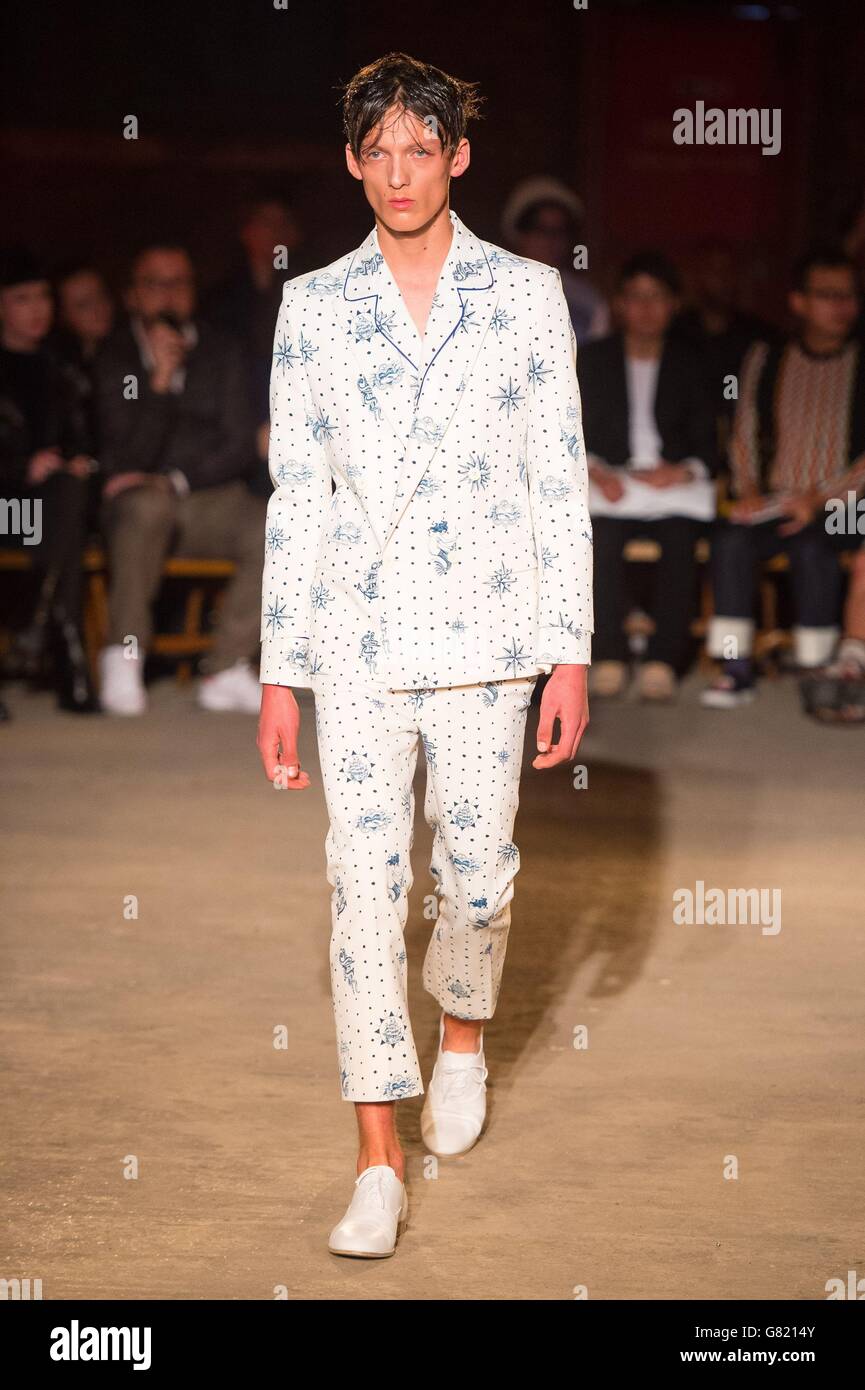 A model on the catwalk during the Alexander McQueen fashion show at the Arches, Ewer Street, London, during the British Fashion Council's London Collections: Men 2015. Stock Photo