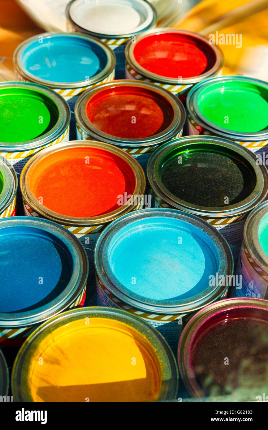 Colorful paint tins Stock Photo