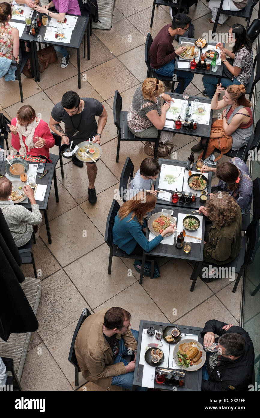 UK,London,The South Bank- elevated view of people dining in oriental restaurant Stock Photo