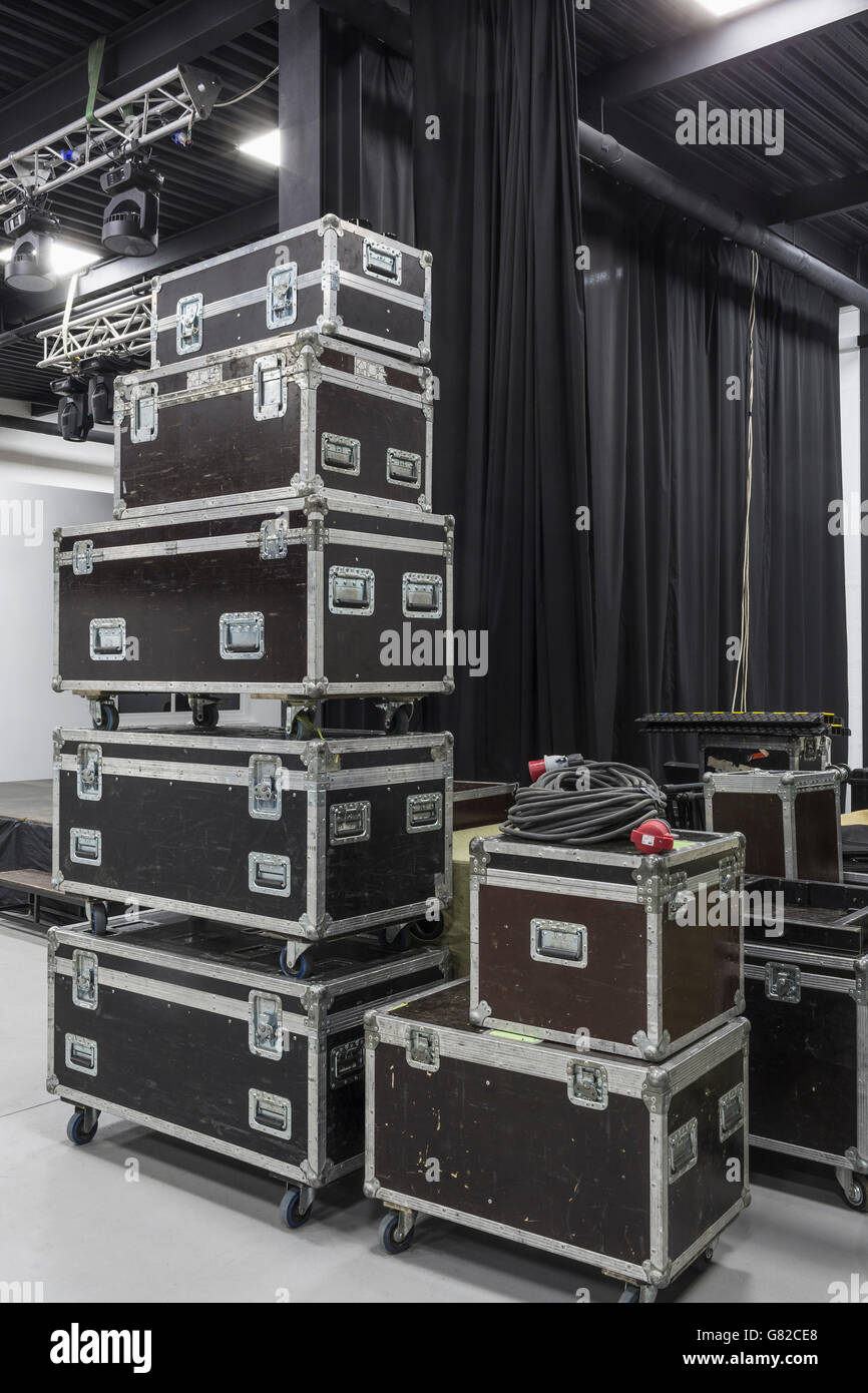 Stack of audio equipment boxes in studio Stock Photo - Alamy