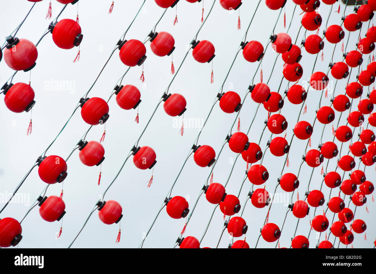 Tilt image of red Chinese lanterns hanging against sky Stock Photo - Alamy