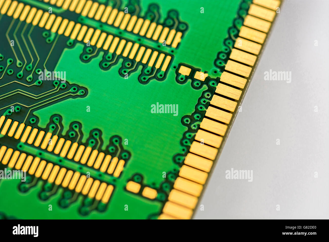 Computer memory concept. Underside of 184-pin DDR SDRAM module showing edge connectors of the DIMM (dual in-line memory module). Stock Photo