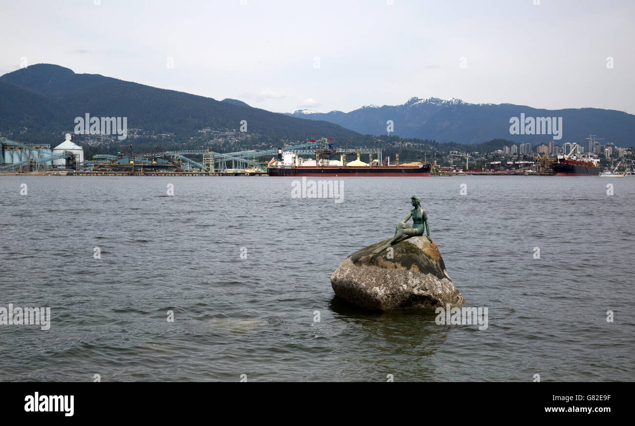 Bronze sculpture of "Girl in Wetsuit" on large boulder off the north