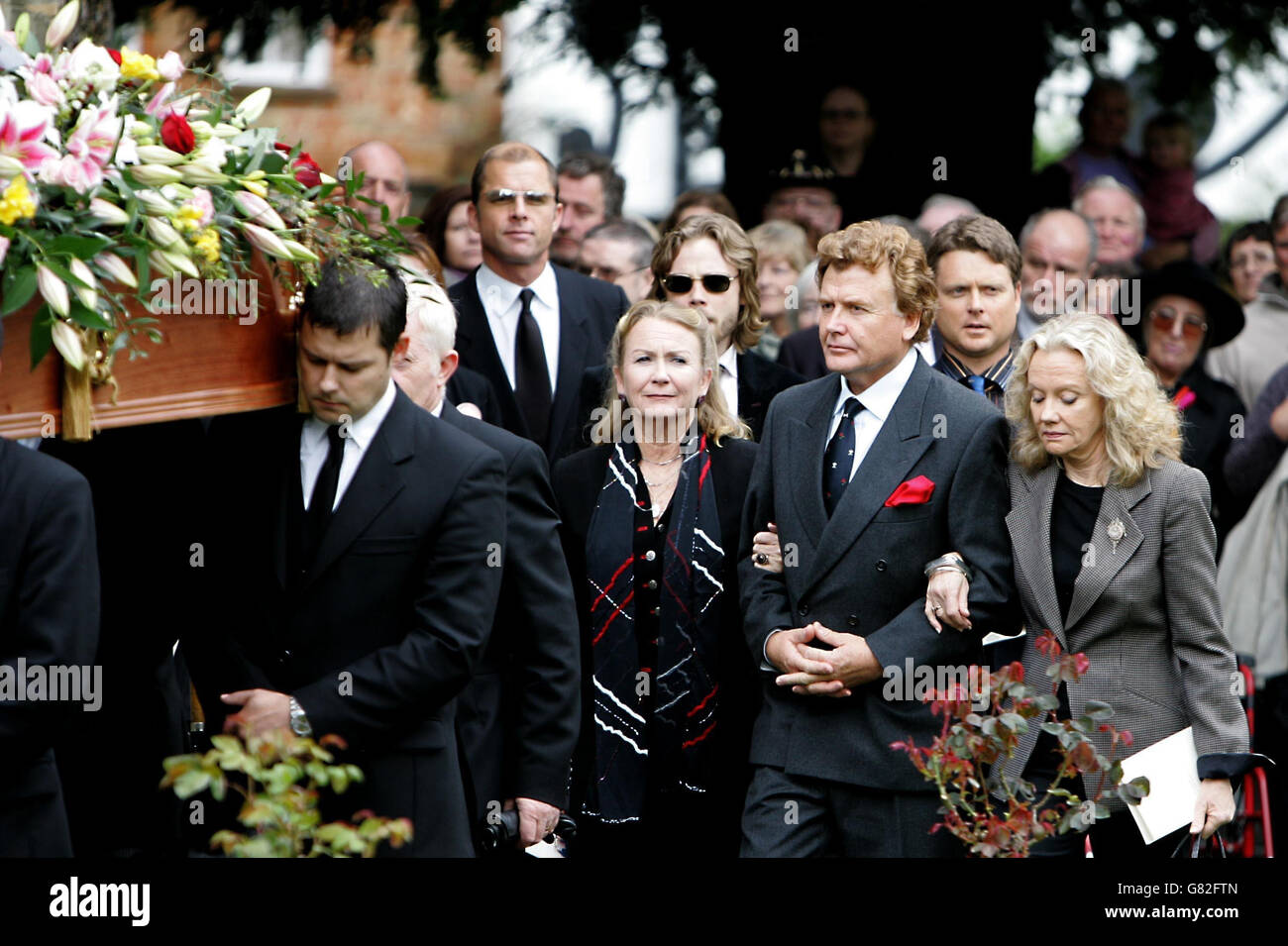 Following the coffin of thier father Juliet Johnathan and Hayley mills after the funeral of their father Sir John Mills. Sir John died on Saturday aged 97 at his home in the town where he had lived for 30 years. Stock Photo