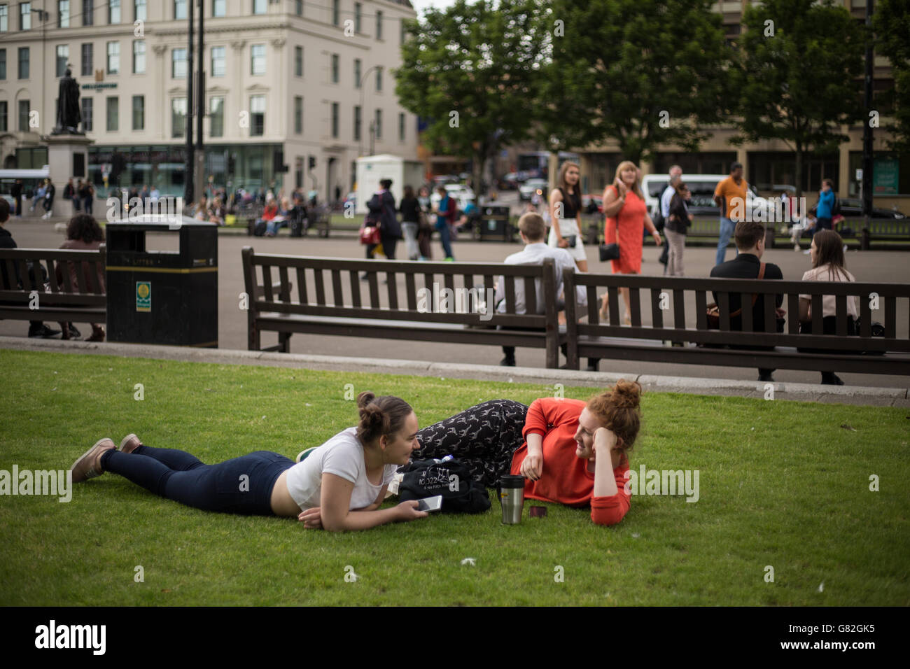 Glaswegians go about their normal life in George Square, with little sign of the EU Referendum in the streets, as voting takes place on the United Kingdom's referendum on European Union membership, in Glasgow, Scotland, on 23 June 2016. Stock Photo