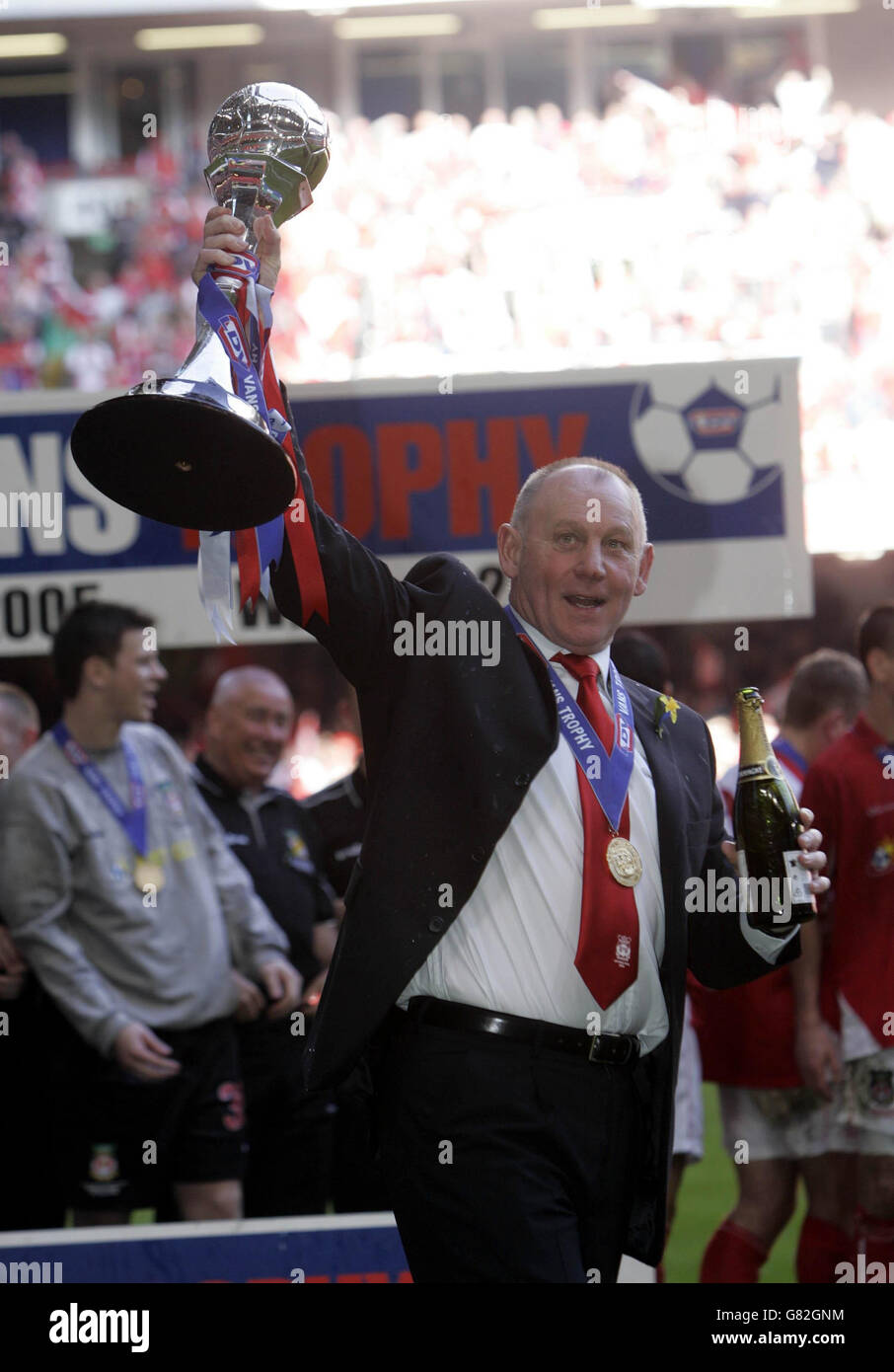 Soccer - LDV Vans Trophy - Final - Southend United v Wrexham - Millennium Stadium. Wrexham manager Denis Smith celebrates with the trophy after their 2-0 victory over Southend. Stock Photo