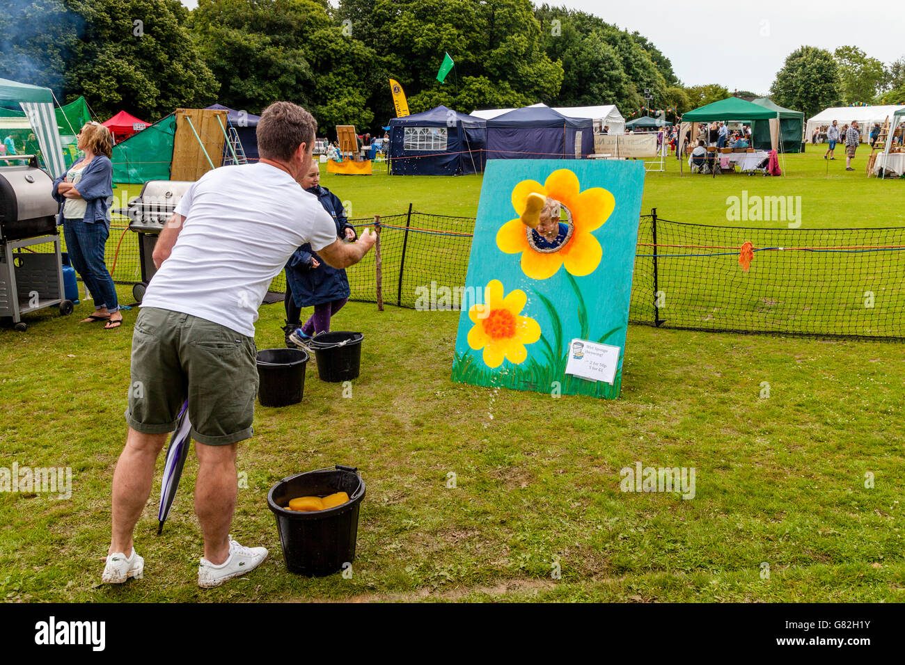 Wet Sponge Throwing At The Annual Village Fete In Nutley, East Sussex, UK Stock Photo