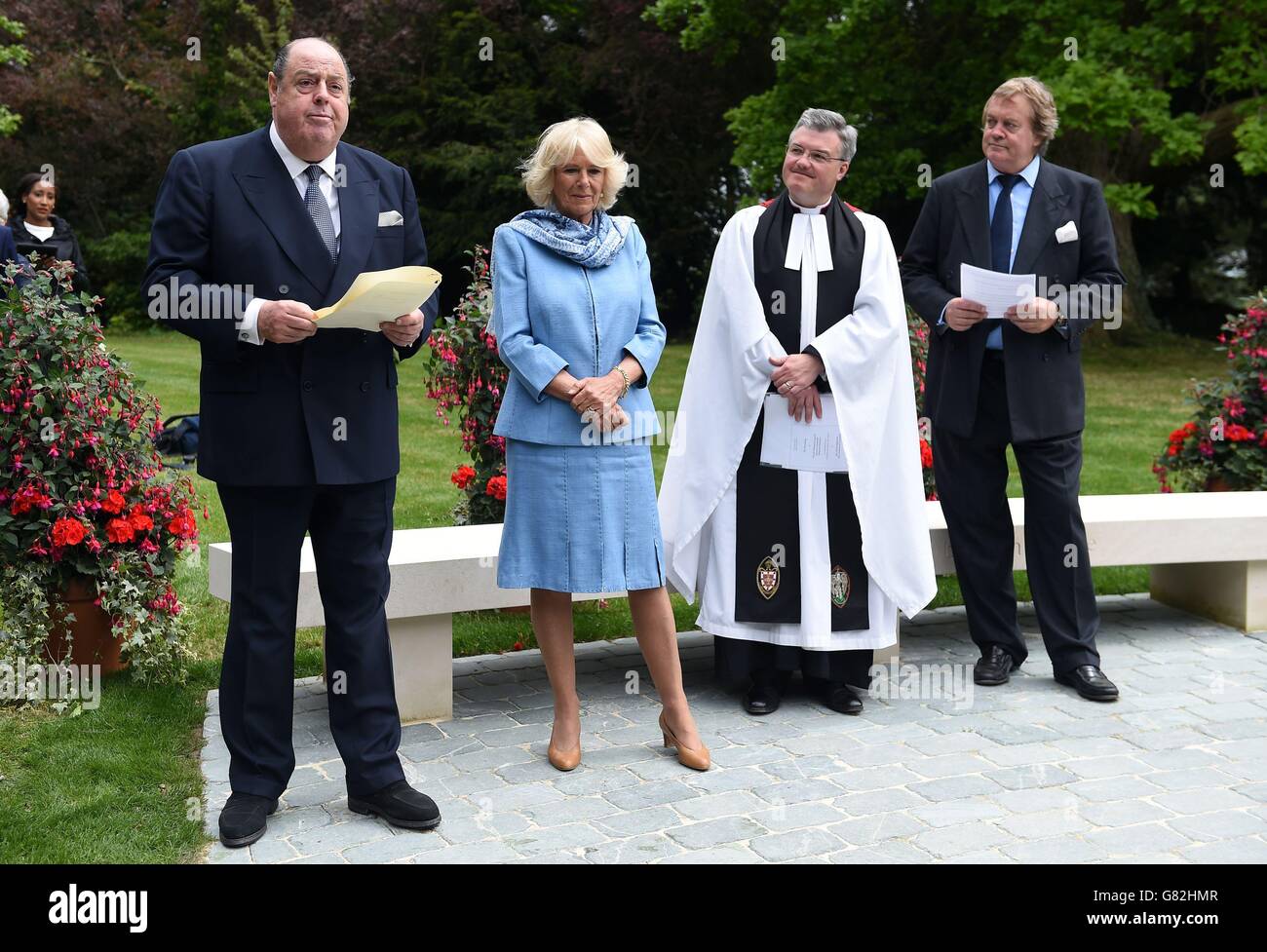 The Duchess of Cornwall (second right), the Duke of Marlborough, Jamie Spencer-Churchill (right) and the reverend Canon Adrian Daffern look on as Sir Nicholas Soames MP (left) makes a speech before the unveiling of a bust of Sir Winston Churchill int he grounds of Blenheim Palace, Oxfordshire. Stock Photo