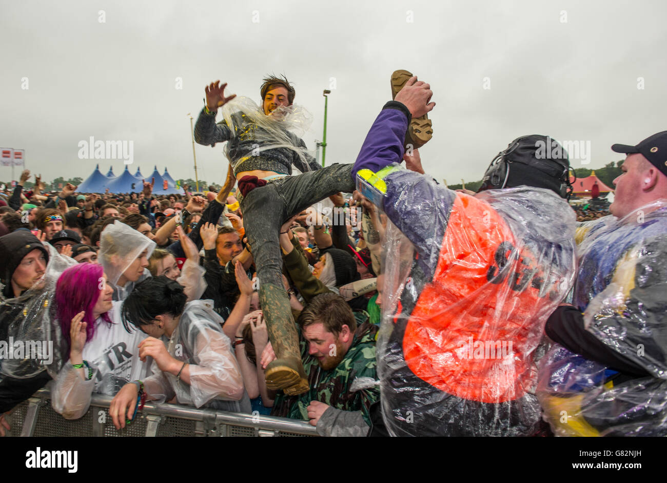 Download Festival 2015 - Day Two - Donington Park. Crowd surfers on day 2 of Download festival on June 13, 2015 in Donington Park, United Kingdom Stock Photo