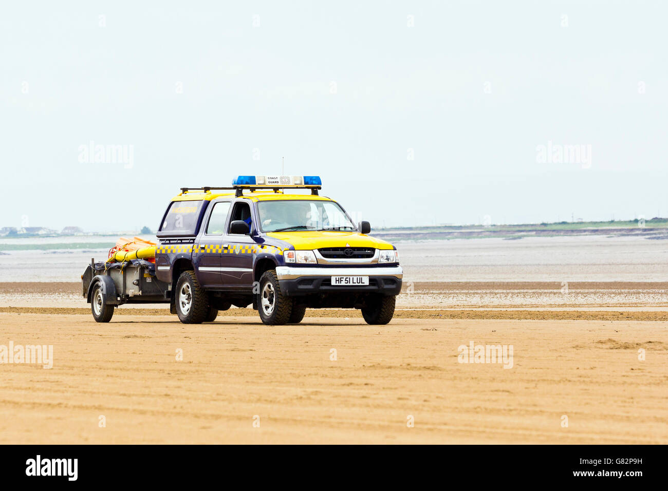 Coastguard vehicle on the beach at Weston-Super-Mare, North Somerset, UK Stock Photo