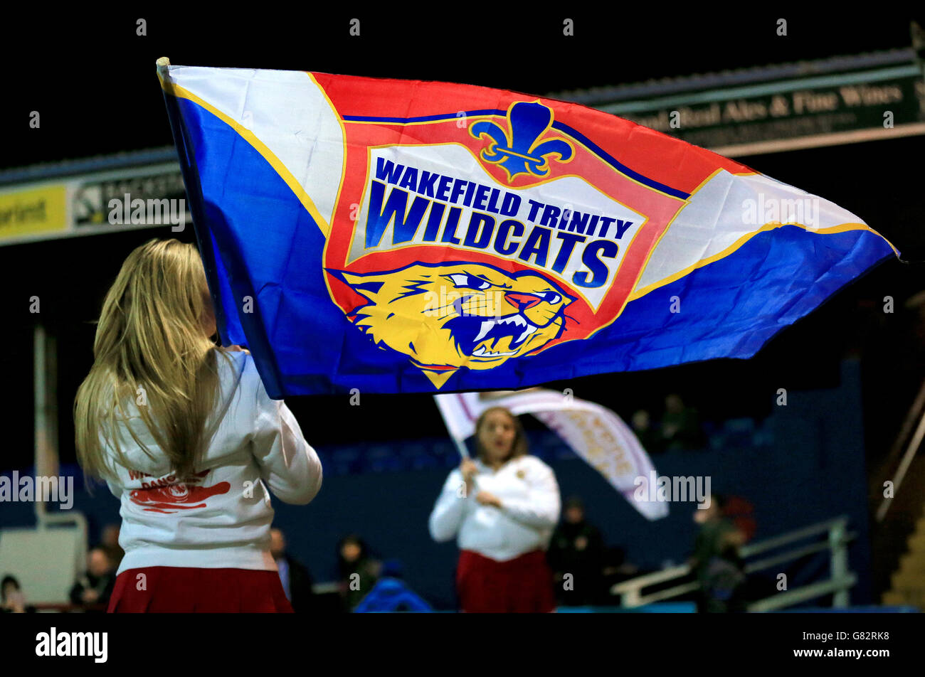 Rugby League - First Utility Super League - Wakefield Wildcats v St Helens - The Rapid Solicitors Stadium. A Wakefield Wildcats flagbearer before the game Stock Photo