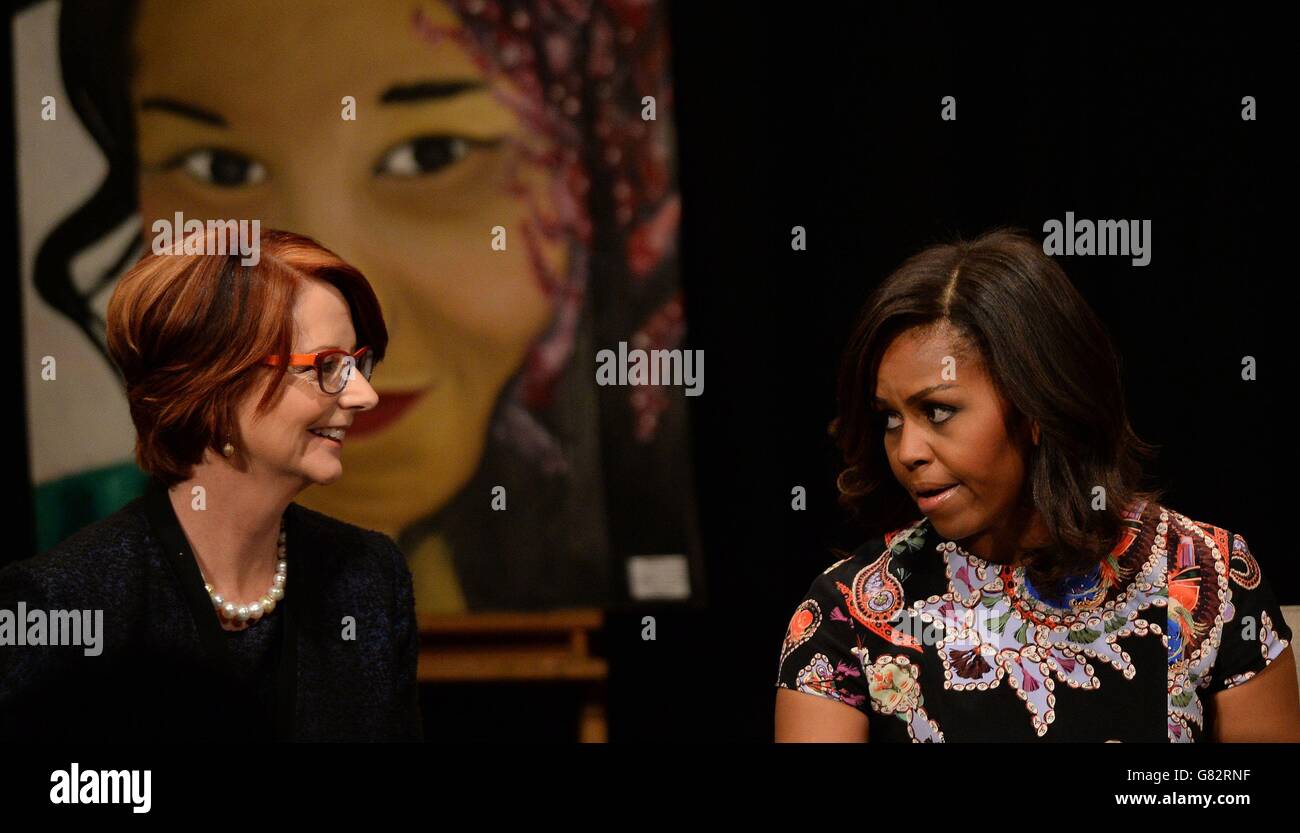 US first lady Michelle Obama (right) and former Australian Prime Minister Julia Gillard hold a Q&A with pupils at the Mulberry School for Girls in Tower Hamlets, east London. Stock Photo