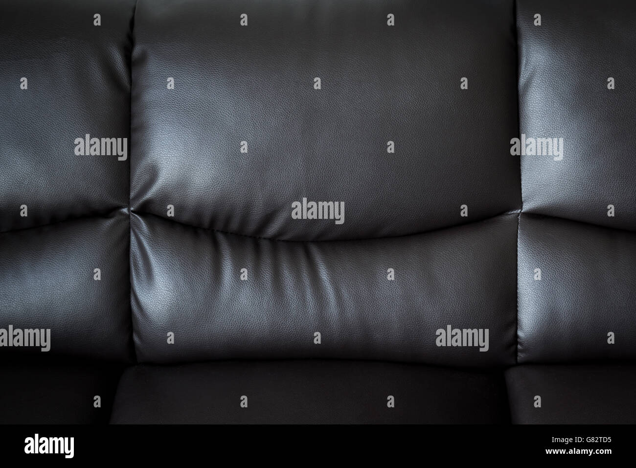close up black leather sofa and textured and background with space. Stock Photo