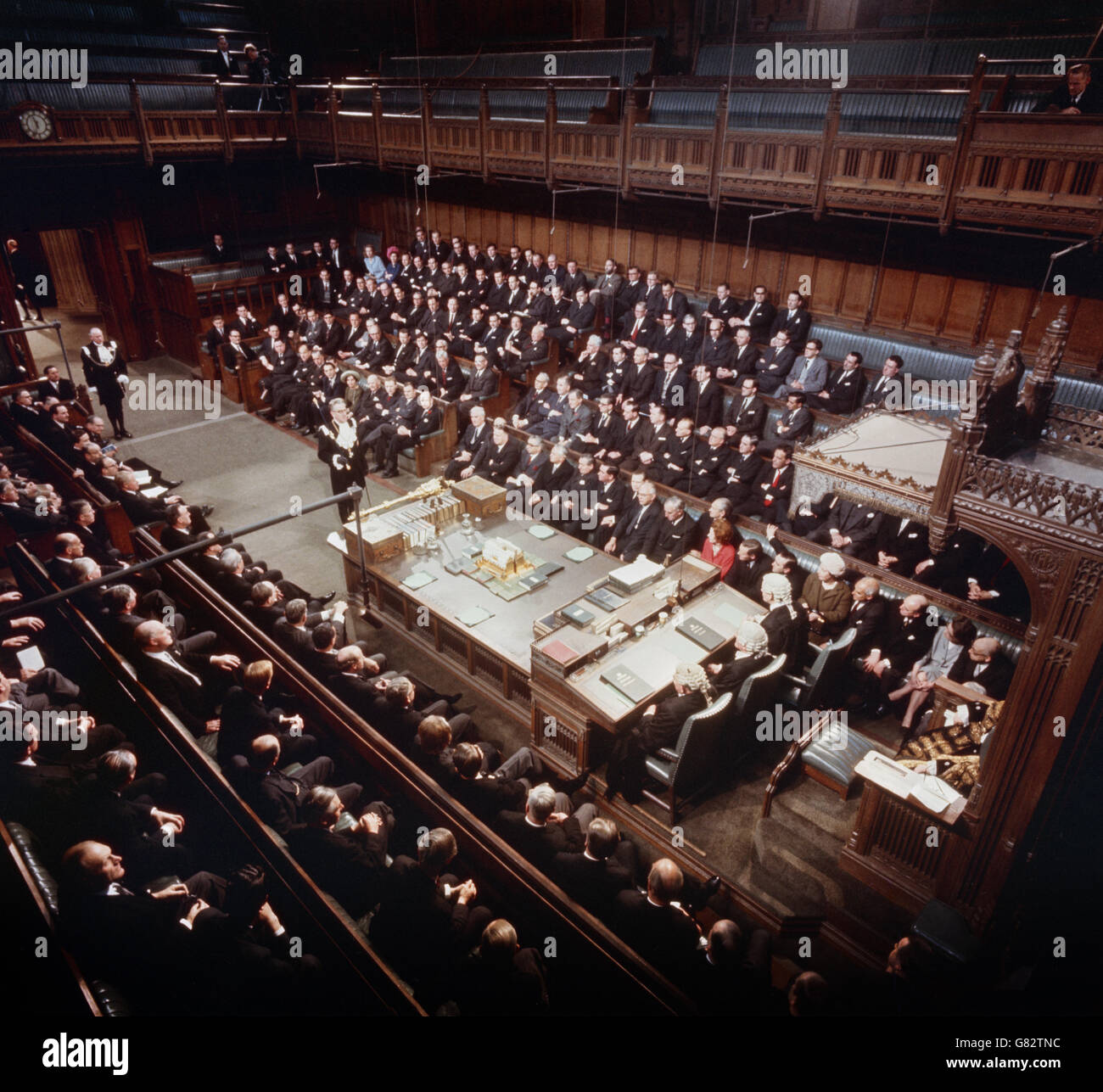 Government front-benchers are seen waiting awaiting the summons to the House of Lords for the State Opening Ceremony. (l-r) Edward Short, Roy Jenkins, Arthur Bottomley, George Brown, Harold Wilson, James Callaghan, Denis Healey, William Ross, Frank Cousins, and Fred Peart. It was the first time that TV and Press cameras were allowed into the House of Commons. Stock Photo
