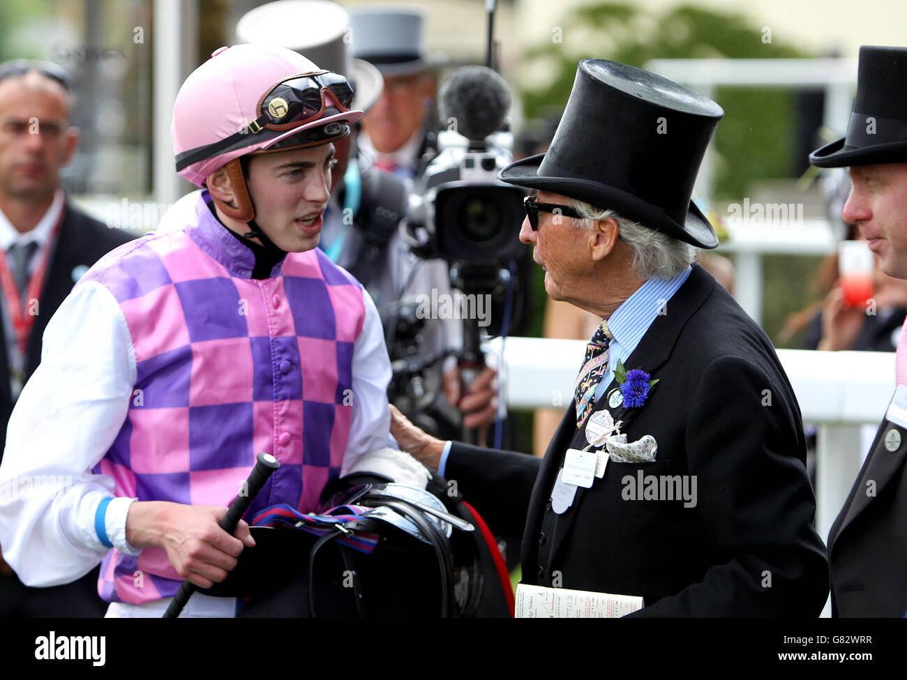 Winning owner Sir Robert Ogden talks to jockey James Doyle after
