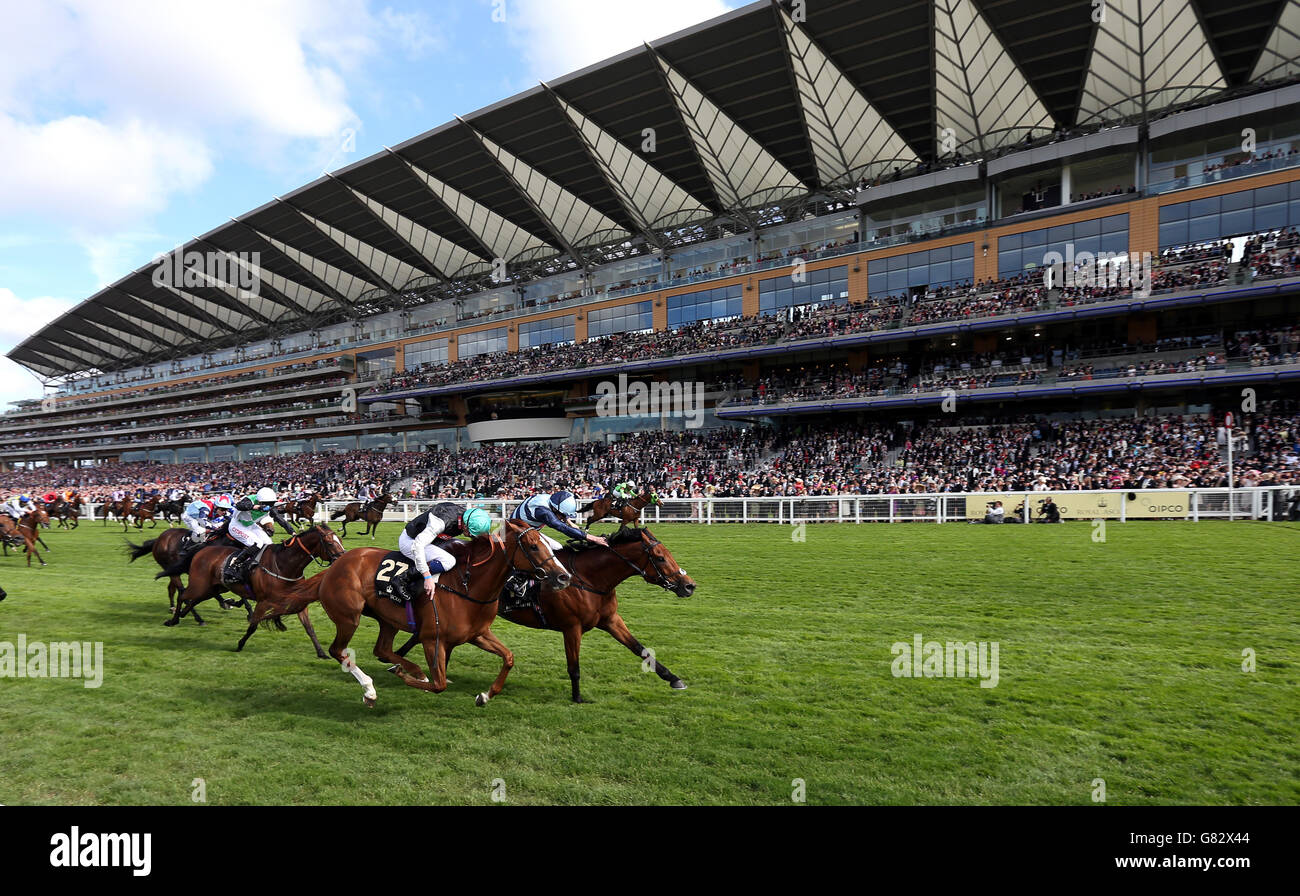 Gm Hopkins ridden by jockey Ryan Moore wins the Royal Hunt Cup ahead of Temptress ridden by jockey James Doyle (left) on day two of the 2015 Royal Ascot Meeting at Ascot Racecourse, Berkshire. Stock Photo