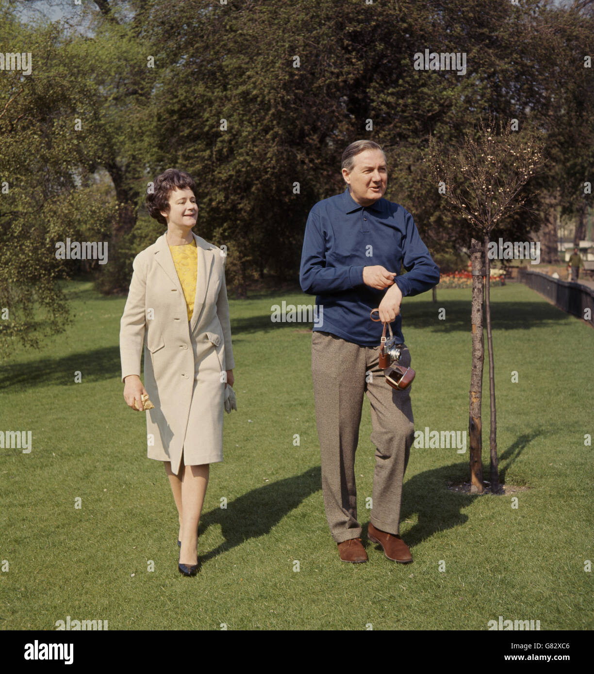 James Callaghan, Chancellor of the Exchequer, with his camera and his wife during a walk in St. James' Park prior to Budget Day. Stock Photo