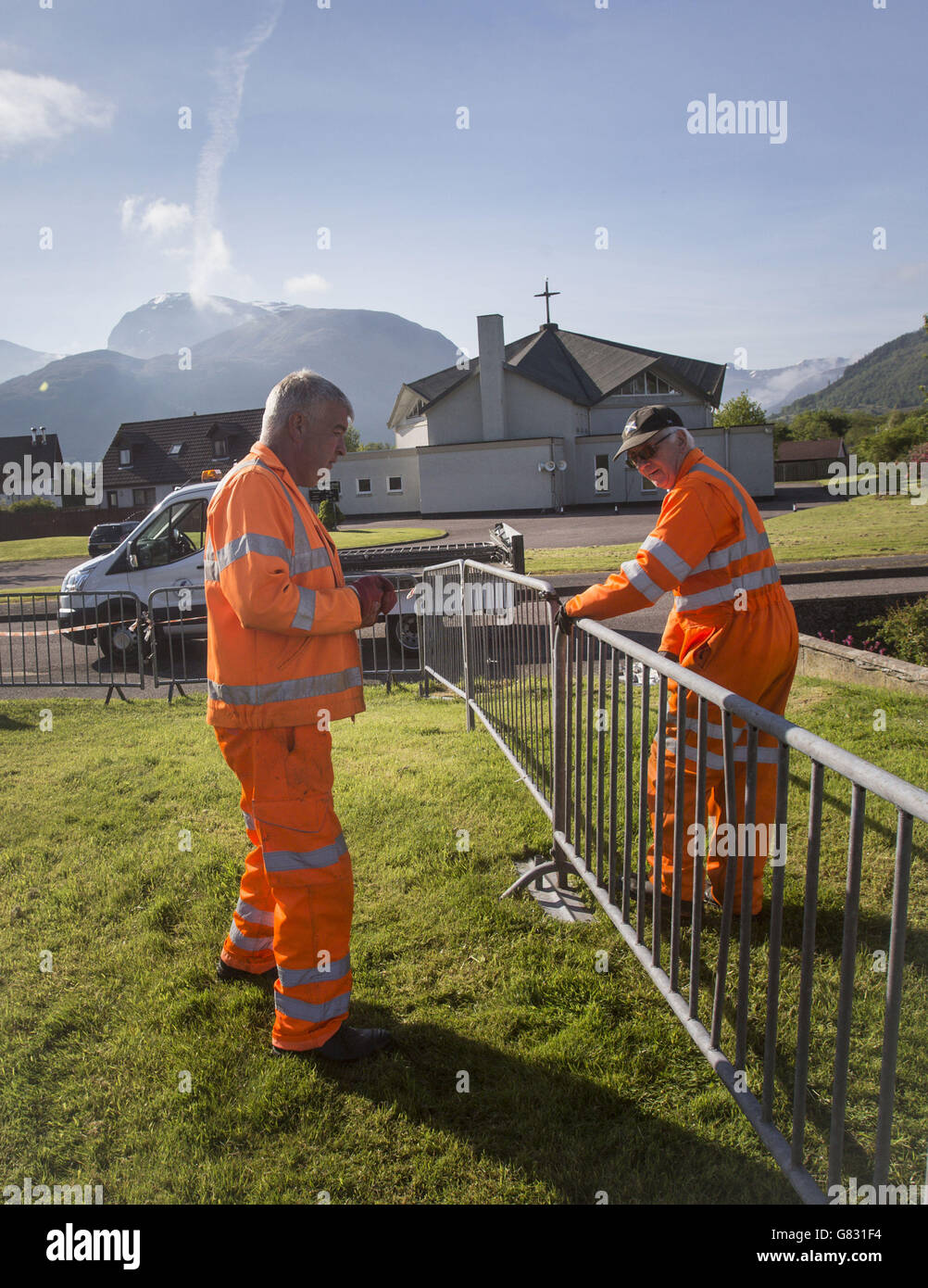 Workers build a media pen ahead of the funeral of former Liberal Democrat leader Charles Kennedy at St John the Evangelist church near Fort William in Scotland. Stock Photo
